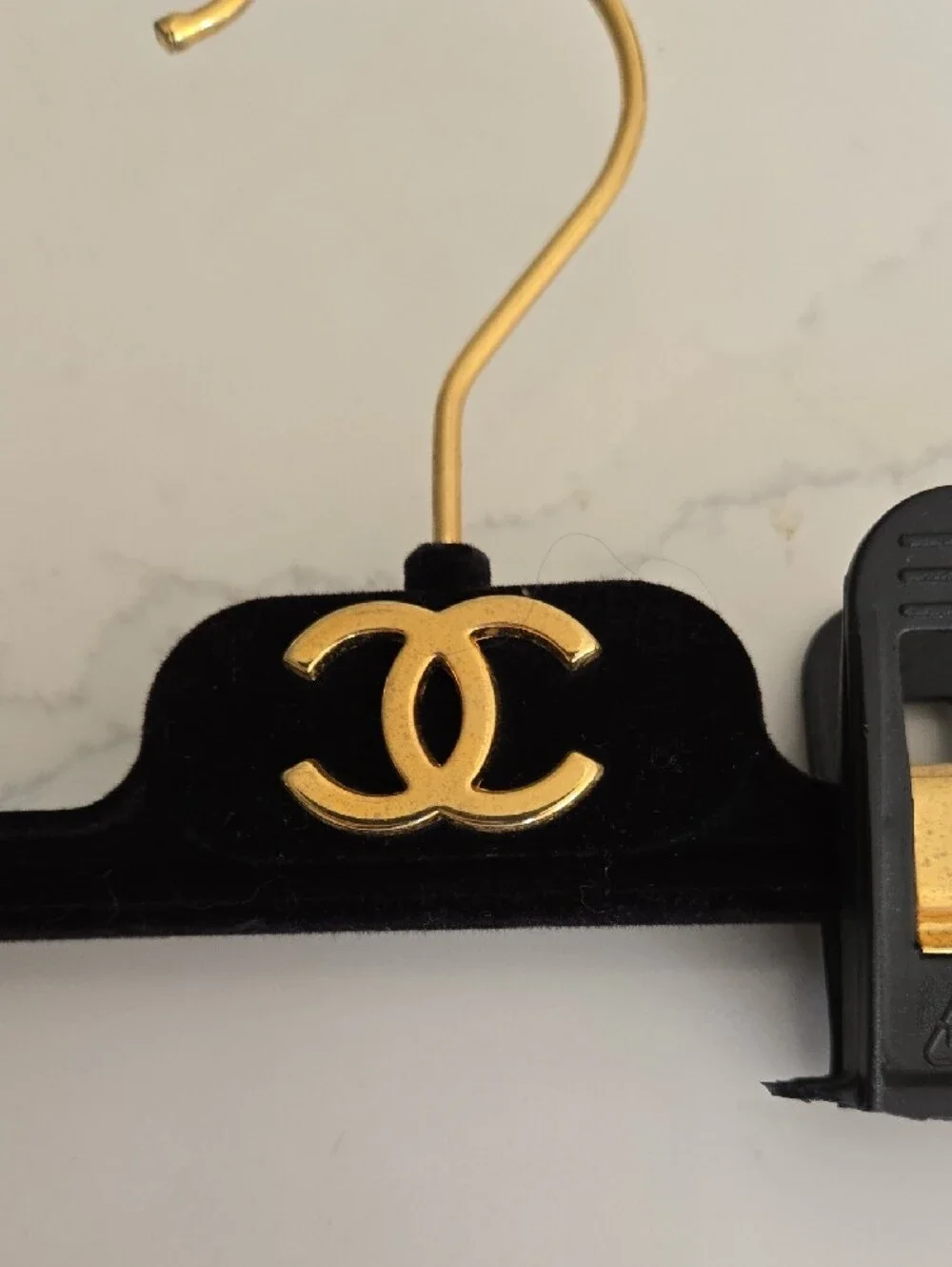 CHANEL Black and Gold Velvet Clip Hanger with CC Emblem